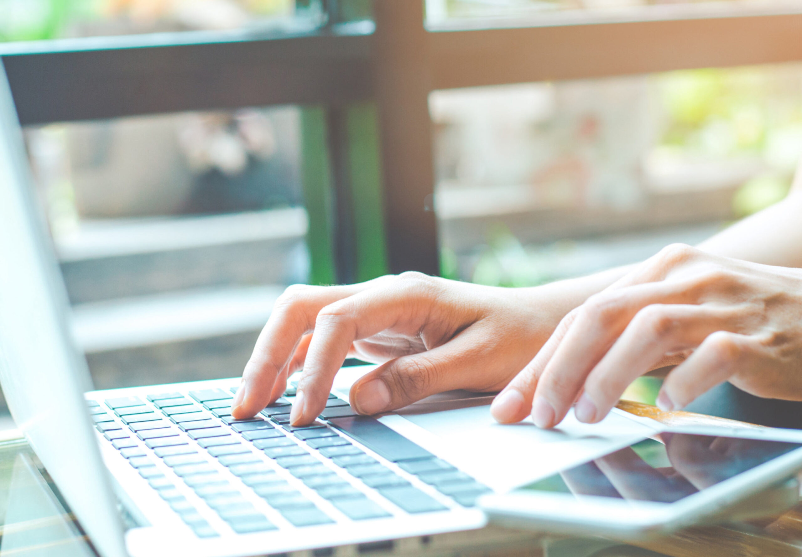 woman using computer for blogging